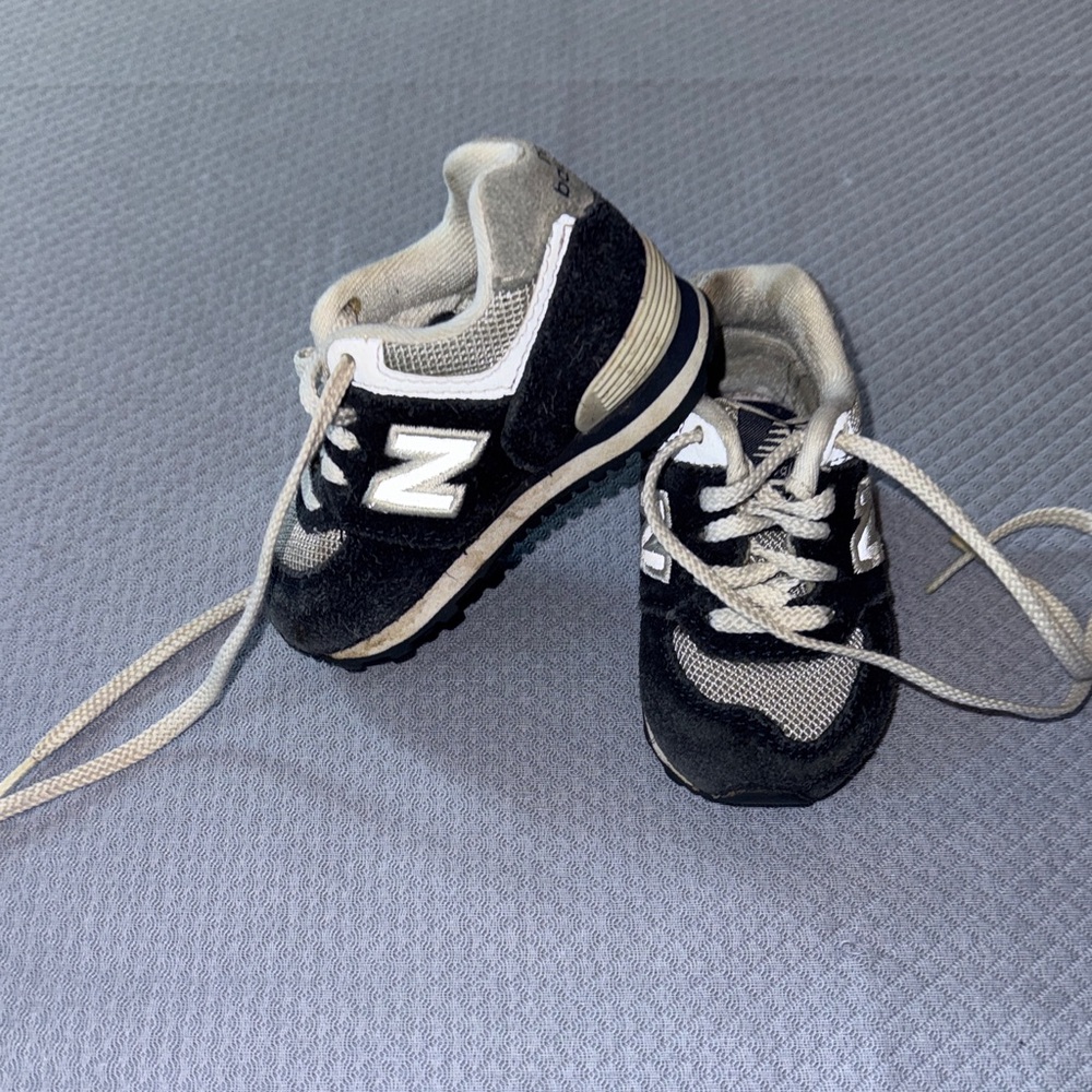 New Balance Kids Black and White Lace-Up Sneakers